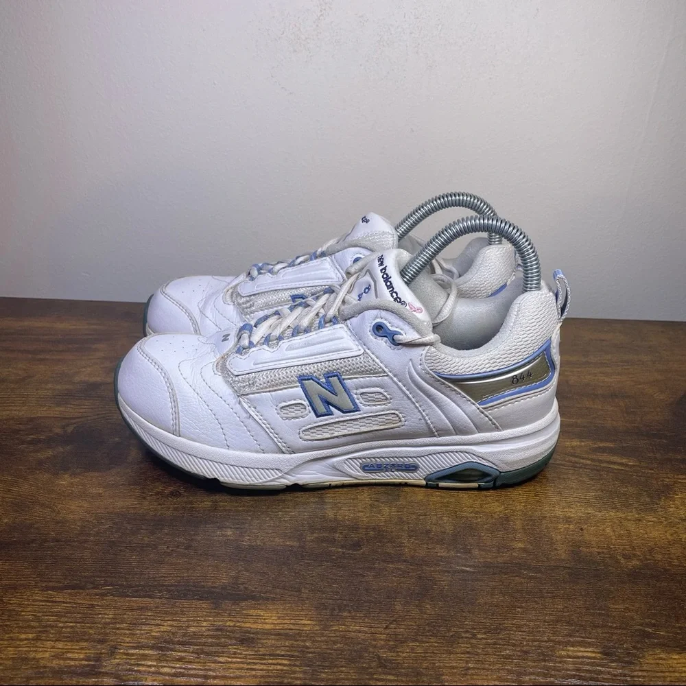 New Balance White Athletic Sneakers with Blue Accents